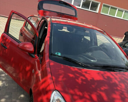 Красный Опель Корса, объемом двигателя 1.22 л и пробегом 216 тыс. км за 3800 $, фото 8 на Automoto.ua