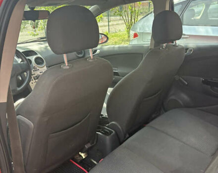 Красный Опель Корса, объемом двигателя 1.22 л и пробегом 216 тыс. км за 3800 $, фото 17 на Automoto.ua