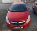 Красный Опель Корса, объемом двигателя 1.23 л и пробегом 153 тыс. км за 5500 $, фото 2 на Automoto.ua