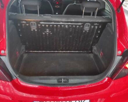 Красный Опель Корса, объемом двигателя 1.2 л и пробегом 195 тыс. км за 5000 $, фото 5 на Automoto.ua