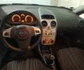 Красный Опель Корса, объемом двигателя 1.2 л и пробегом 260 тыс. км за 3500 $, фото 7 на Automoto.ua
