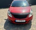 Красный Опель Корса, объемом двигателя 1.2 л и пробегом 180 тыс. км за 4000 $, фото 2 на Automoto.ua