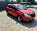 Красный Опель Корса, объемом двигателя 1.2 л и пробегом 180 тыс. км за 4000 $, фото 1 на Automoto.ua