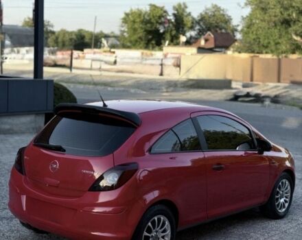 Красный Опель Корса, объемом двигателя 1.2 л и пробегом 147 тыс. км за 4950 $, фото 2 на Automoto.ua