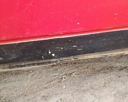 Красный Опель Корса, объемом двигателя 1.2 л и пробегом 200 тыс. км за 500 $, фото 1 на Automoto.ua