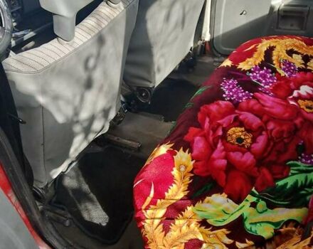 Красный Опель Корса, объемом двигателя 1.2 л и пробегом 200 тыс. км за 500 $, фото 16 на Automoto.ua