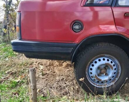 Красный Опель Корса, объемом двигателя 1.2 л и пробегом 200 тыс. км за 500 $, фото 9 на Automoto.ua