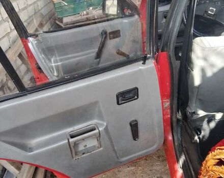 Красный Опель Корса, объемом двигателя 1.2 л и пробегом 200 тыс. км за 500 $, фото 14 на Automoto.ua