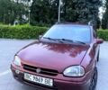 Красный Опель Корса, объемом двигателя 1.4 л и пробегом 309 тыс. км за 1510 $, фото 1 на Automoto.ua