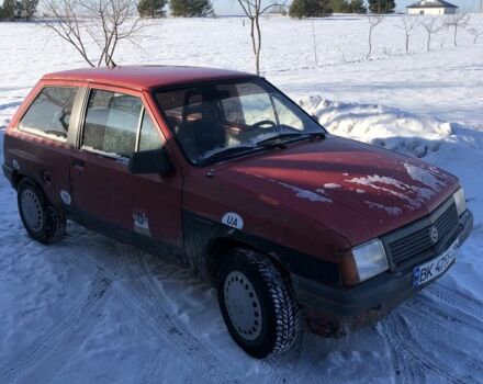 Красный Опель Корса, объемом двигателя 1.3 л и пробегом 300 тыс. км за 550 $, фото 1 на Automoto.ua