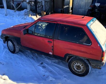 Красный Опель Корса, объемом двигателя 1.3 л и пробегом 340 тыс. км за 550 $, фото 1 на Automoto.ua