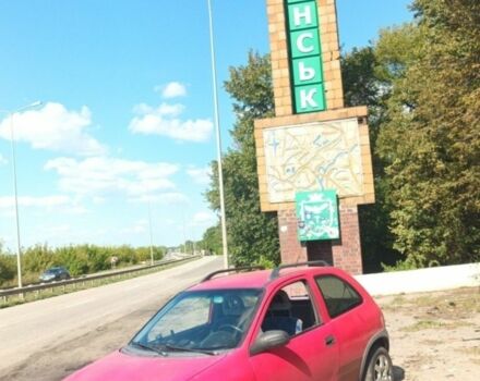 Красный Опель Корса, объемом двигателя 1.2 л и пробегом 250 тыс. км за 1182 $, фото 1 на Automoto.ua