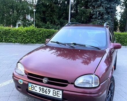 Красный Опель Корса, объемом двигателя 1.4 л и пробегом 309 тыс. км за 1510 $, фото 1 на Automoto.ua