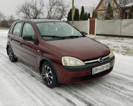Красный Опель Корса, объемом двигателя 1 л и пробегом 216 тыс. км за 3300 $, фото 1 на Automoto.ua