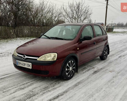 Красный Опель Корса, объемом двигателя 0.97 л и пробегом 216 тыс. км за 3050 $, фото 1 на Automoto.ua