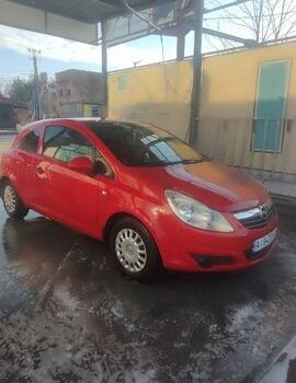 Червоний Опель Корса, об'ємом двигуна 1.23 л та пробігом 200 тис. км за 3800 $, фото 1 на Automoto.ua