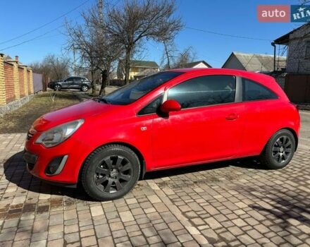 Красный Опель Корса, объемом двигателя 1.23 л и пробегом 195 тыс. км за 4650 $, фото 1 на Automoto.ua