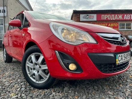 Красный Опель Корса, объемом двигателя 1.2 л и пробегом 77 тыс. км за 5800 $, фото 1 на Automoto.ua