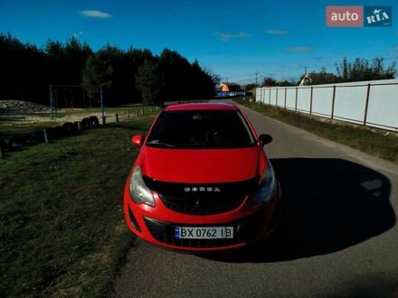 Красный Опель Корса, объемом двигателя 1.23 л и пробегом 200 тыс. км за 6200 $, фото 1 на Automoto.ua