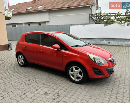Красный Опель Корса, объемом двигателя 1.25 л и пробегом 176 тыс. км за 6500 $, фото 1 на Automoto.ua