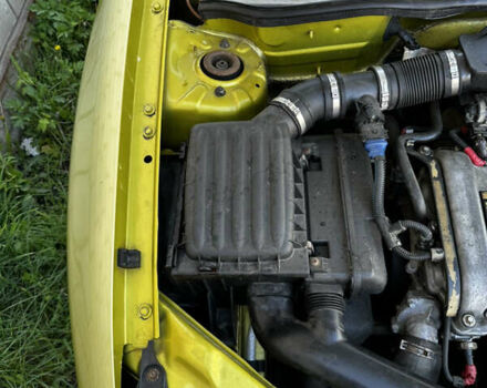 Жовтий Опель Корса, об'ємом двигуна 1 л та пробігом 148 тис. км за 3200 $, фото 12 на Automoto.ua