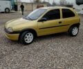 Желтый Опель Корса, объемом двигателя 1 л и пробегом 230 тыс. км за 1800 $, фото 1 на Automoto.ua