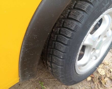 Желтый Опель Корса, объемом двигателя 1 л и пробегом 380 тыс. км за 2500 $, фото 14 на Automoto.ua