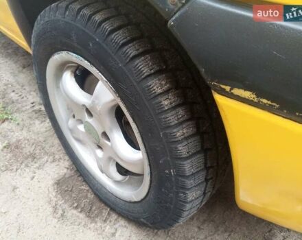 Желтый Опель Корса, объемом двигателя 0.97 л и пробегом 379 тыс. км за 2500 $, фото 9 на Automoto.ua