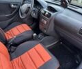 Желтый Опель Корса, объемом двигателя 1.2 л и пробегом 184 тыс. км за 3500 $, фото 2 на Automoto.ua