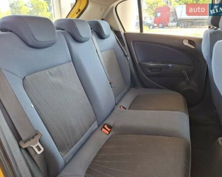 Желтый Опель Корса, объемом двигателя 1.23 л и пробегом 170 тыс. км за 6100 $, фото 18 на Automoto.ua