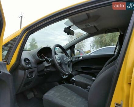 Желтый Опель Корса, объемом двигателя 1.23 л и пробегом 176 тыс. км за 5500 $, фото 17 на Automoto.ua
