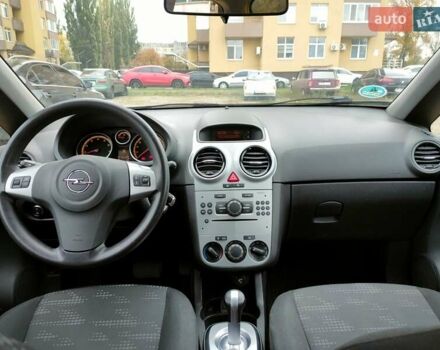 Желтый Опель Корса, объемом двигателя 1.23 л и пробегом 176 тыс. км за 5750 $, фото 5 на Automoto.ua