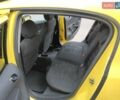 Желтый Опель Корса, объемом двигателя 1.23 л и пробегом 176 тыс. км за 5500 $, фото 9 на Automoto.ua