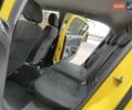 Желтый Опель Корса, объемом двигателя 1.23 л и пробегом 176 тыс. км за 5750 $, фото 11 на Automoto.ua