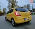 Желтый Опель Корса, объемом двигателя 1.23 л и пробегом 176 тыс. км за 5500 $, фото 12 на Automoto.ua