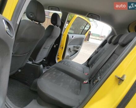 Желтый Опель Корса, объемом двигателя 1.23 л и пробегом 176 тыс. км за 5500 $, фото 25 на Automoto.ua