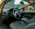 Желтый Опель Корса, объемом двигателя 1.23 л и пробегом 176 тыс. км за 5750 $, фото 3 на Automoto.ua
