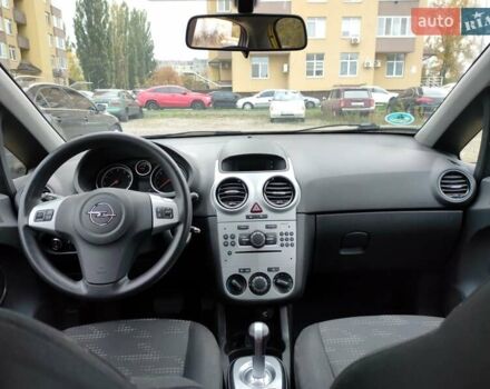 Желтый Опель Корса, объемом двигателя 1.23 л и пробегом 176 тыс. км за 5500 $, фото 7 на Automoto.ua