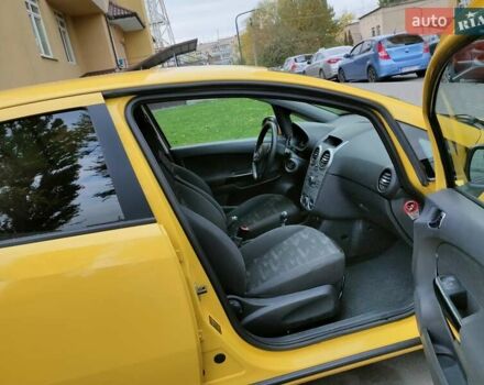 Желтый Опель Корса, объемом двигателя 1.23 л и пробегом 176 тыс. км за 5500 $, фото 29 на Automoto.ua