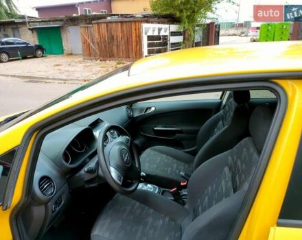 Желтый Опель Корса, объемом двигателя 1.23 л и пробегом 176 тыс. км за 5500 $, фото 21 на Automoto.ua