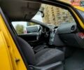 Желтый Опель Корса, объемом двигателя 1.23 л и пробегом 176 тыс. км за 5750 $, фото 24 на Automoto.ua
