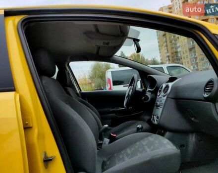 Желтый Опель Корса, объемом двигателя 1.23 л и пробегом 176 тыс. км за 5500 $, фото 13 на Automoto.ua