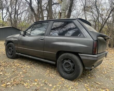 Серый Опель Корса, объемом двигателя 1.3 л и пробегом 333 тыс. км за 600 $, фото 5 на Automoto.ua