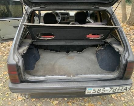 Серый Опель Корса, объемом двигателя 1.3 л и пробегом 333 тыс. км за 600 $, фото 14 на Automoto.ua