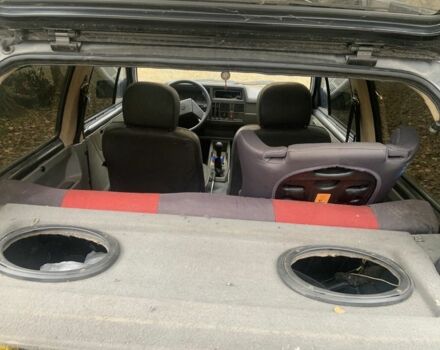 Серый Опель Корса, объемом двигателя 1.3 л и пробегом 333 тыс. км за 600 $, фото 13 на Automoto.ua