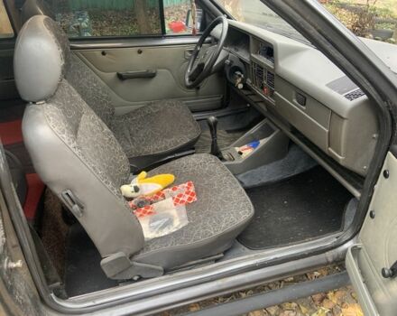 Серый Опель Корса, объемом двигателя 1.3 л и пробегом 333 тыс. км за 600 $, фото 11 на Automoto.ua