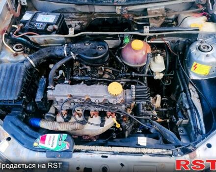 Серый Опель Корса, объемом двигателя 12 л и пробегом 80 тыс. км за 1500 $, фото 4 на Automoto.ua