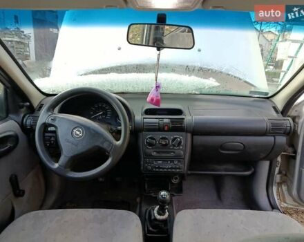 Серый Опель Корса, объемом двигателя 1.2 л и пробегом 220 тыс. км за 550 $, фото 4 на Automoto.ua