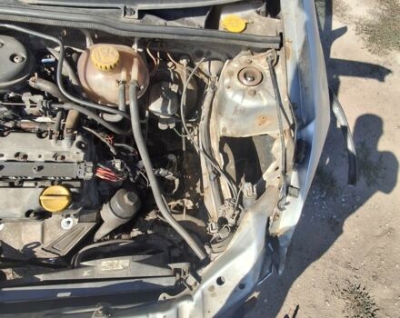 Серый Опель Корса, объемом двигателя 1 л и пробегом 200 тыс. км за 238 $, фото 6 на Automoto.ua