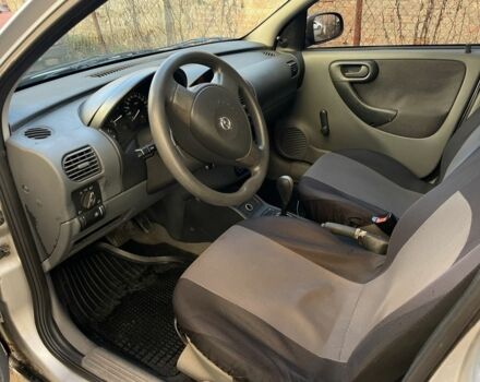 Серый Опель Корса, объемом двигателя 1.2 л и пробегом 200 тыс. км за 2350 $, фото 5 на Automoto.ua